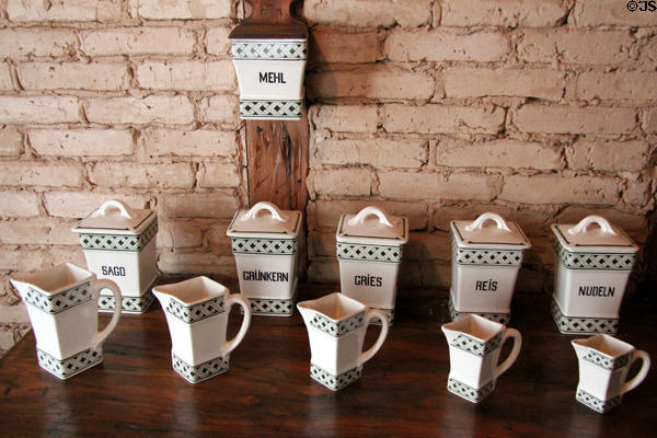 Matching porcelain canisters & measuring cups in Jahn House at Conservation Plaza. New Braunfels, TX.