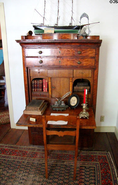 Drop front desk in parlor of Baetge House at Conservation Plaza. New Braunfels, TX.