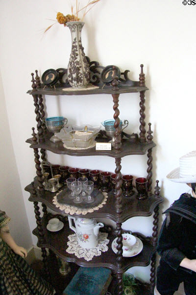Étagère in parlor of Baetge House at Conservation Plaza. New Braunfels, TX.