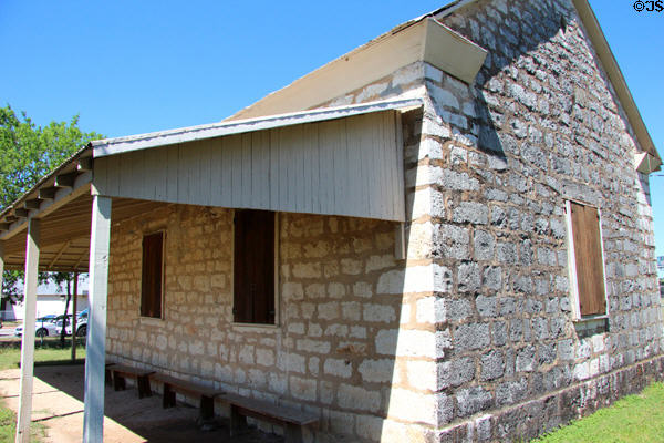 Church Hill School (1870) built of hand-hewn limestone & first to be located in the area at Conservation Plaza. New Braunfels, TX.