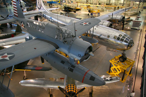 Vought-Sikorsky OS2U-3 Kingfisher (1937) over Enola Gay at National Air & Space Museum. Chantilly, VA.