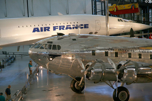 Concorde (1976) over Boeing 307 Stratoliner Clipper Flying Cloud at National Air & Space Museum. Chantilly, VA.