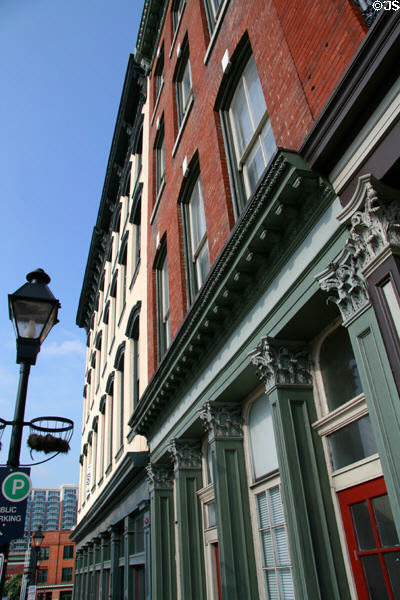 Row of heritage commercial buildings (S. 14th St. at E. Main St.). Richmond, VA.