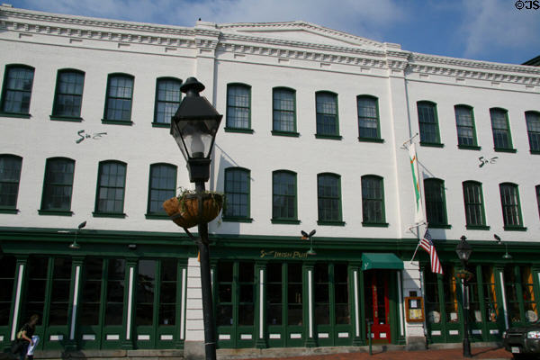 Italianate building (c1872) (1325-7 E. Cary St.). Richmond, VA. Architect: Albert West (attrib).