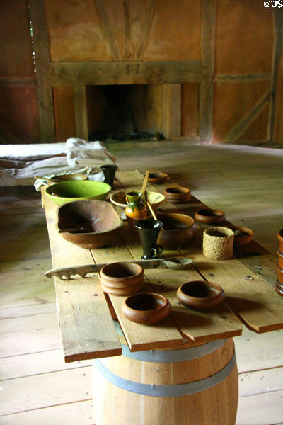 Table with wooden & earthenware vessels in hospital building at Henricus. VA.