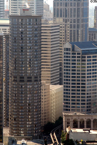 Downtown Seattle from Space Needle with round Westin Seattle Towers & blue-roofed Westlake Center. Seattle, WA.