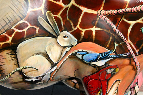 Rabbit & bird detail on Fauna Folly by Jef Raasch in Madison CowParade. Madison, WI.