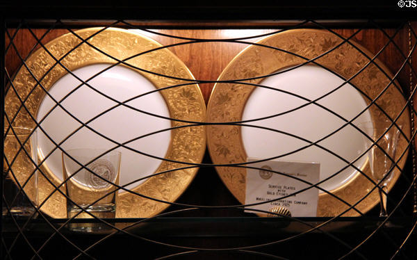 Service plates with gold etched rim by Wheeling Decorating Company (c1925) in family dining room at West Virginia Governor's Mansion. Charleston, WV.