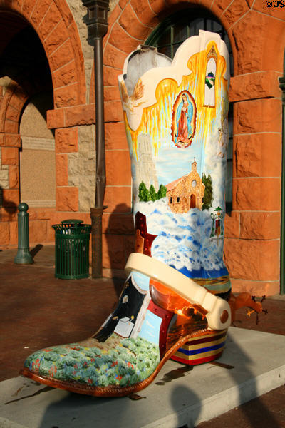 Religion's a Kick cowboy art boot (2004) by Mike McIntosh. Cheyenne, WY.