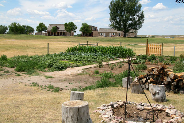 Houses seen across parade ground & garden at Fort Laramie National Historic Site. WY.