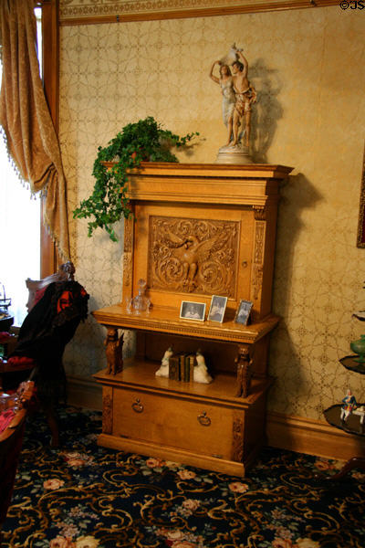 Cabinet with carved eagle in Laramie Plains Museum. Laramie, WY.