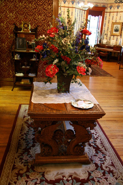 Hall table with flowers in Laramie Plains Museum. Laramie, WY.
