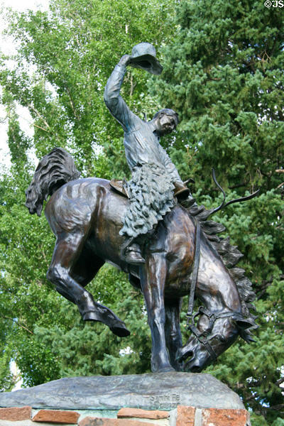 Sculpture of Cowboy on bucking bronco (1976) by Bud Boller in Jackson town park. Jackson, WY.