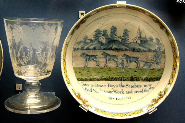 Engraved glass Rummer for rum (1800-20) & tin-glazed earthenware punchbowl (1770) at Walker Art Gallery. Liverpool, England.