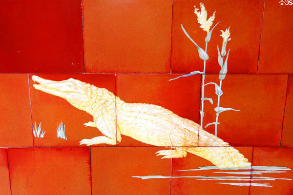 Crocodile painted on tile in Roof Garden at Cardiff Castle. Cardiff, Wales.
