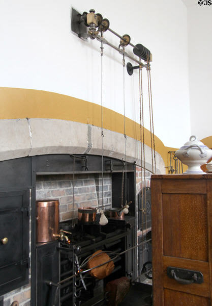 Wind up clockwork rotisserie for roasting meat over a fire at St Fagans Castle. Cardiff, Wales.