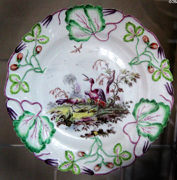 Porcelain plate with nature design over molded elements (1754-7) from Longton Hall, Staffordshire at National Museum of Wales. Cardiff, Wales.