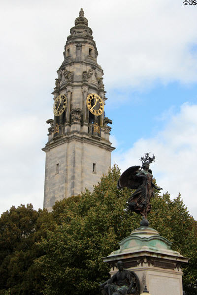 Clock tower on Cardiff City Hall (1906) & Ladysmith-Kimberly statue (c1909) to memory of Welshmen who died during the Boer War in South Africa, sculpted by Albert Toft. Cardiff, Wales.