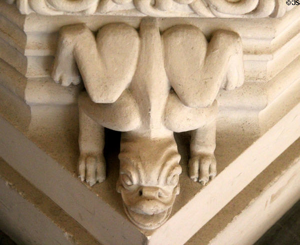Detail of figure on sculpted lamp table at Penrhyn Castle. Bangor, Wales.