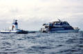 Boats & a submarine allow people to view Barrier Reef of Cairns. Australia