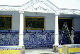 Church courtyard with Portuguese tiles and painter, in Salvador. Brazil.