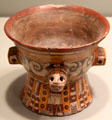 Mixtec culture earthenware drinking vessel with serpent handles perhaps from Cholula or Puebla, Mexico at Gardiner Museum. Toronto, ON.