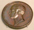 Bronze medal for participants awarded at 1851 London World's Fair made by William Wyon of London at German Historical Museum. Berlin, Germany.