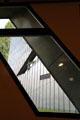 Looking out diagonal window at Jewish Museum Berlin. Berlin, Germany.