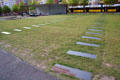 Rows of slabs mark line of tunnels built under Berlin Wall at Bernauer Straße Berlin Wall Memorial. Berlin, Germany.