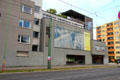 Photo mural of building of Berlin Wall at Bernauer Straße Berlin Wall Memorial. Berlin, Germany.