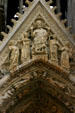Christ with female saints over portal of Cathedral. Reims, France.