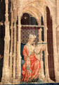 Large figure under a canopy introducing a new section of Apocalypse Tapestry at Angers Chateau. Angers, France.