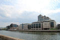 Modern structures on George's Quay along south bank of River Liffey. Dublin, Ireland.