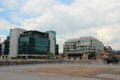 Modern office buildings built around ship turning basin off River Liffey at Custom House Basin. Dublin, Ireland.