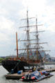 Jeanie Johnstone Tall Ship beyond fire boat. Dublin, Ireland.