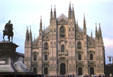 Duomo commissioned by Gian Galeazzo Visconti facade in late afternoon sun. Milan, Italy.