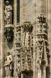 Two female saints on Duomo. Milan, Italy.