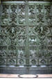 Bronze doors of Duomo. Milan, Italy.