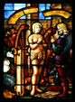 St Catherine with wheels in stained-glass in Duomo. Milan, Italy.