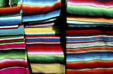 Rainbow colored serapes on display. Mexico City, Mexico.