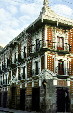 The red & white architecture of Casa Del Alfeäique, Almond-Cake House, in Puebla. Mexico.