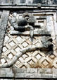Rattlesnake sculpture in Uxmal winds its way around a building in Nunnery Quadrant & finds its tail again. Mexico.