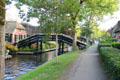 Walkway for strolling the length of main canal. Giethoorn, Netherlands