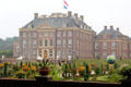 Het Loo Palace viewed in the morning mist from formal gardens. Het Loo, Netherlands