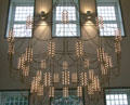 Elegant ceiling lighting fixture in modernized section. Het Loo, Netherlands.