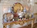 Gilded side table with marble top covered with decorative pieces & silver Montieth in New Dining Room. Het Loo, Netherlands.