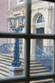 View of wrought iron railings & light fixture through multi-paned window. Het Loo, Netherlands.