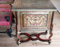 Writing desk with embroidery-like inlaid side panel in library. Het Loo, Netherlands.