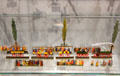 Tin figure models of early steam train cars with passengers waiting to board at National Tin Figure Museum. Ommen, Netherlands.