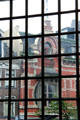 Historic building viewed through panees of glass window. Zwolle, Netherlands.